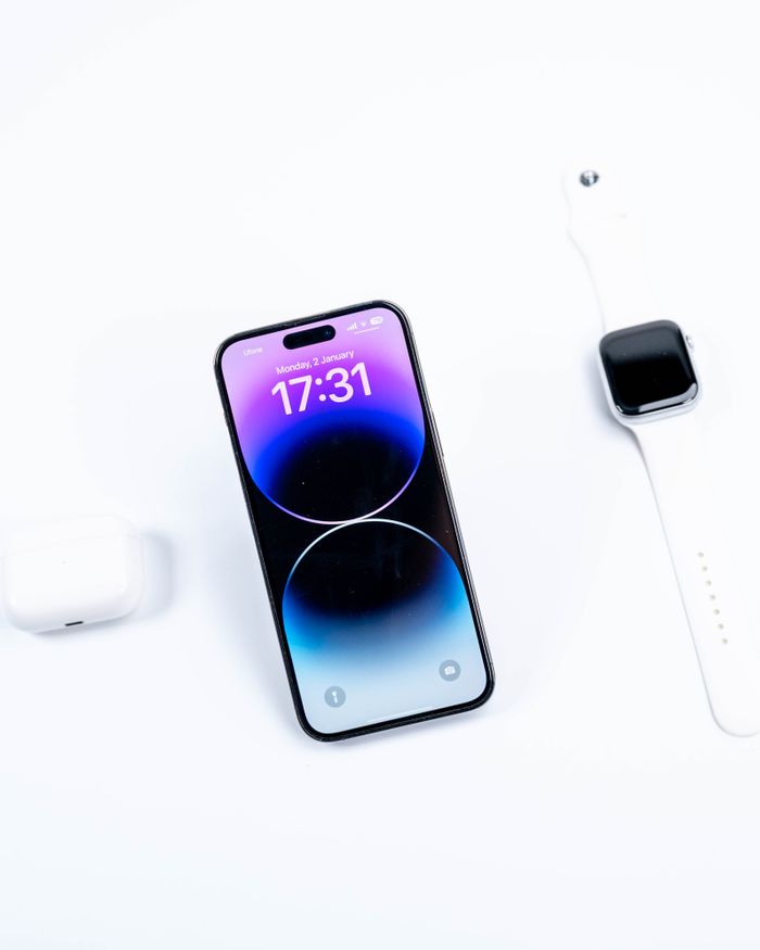 best-selling product-02 Exploring modern technology with a sleek smartphone and smartwatch in a minimalist layout.